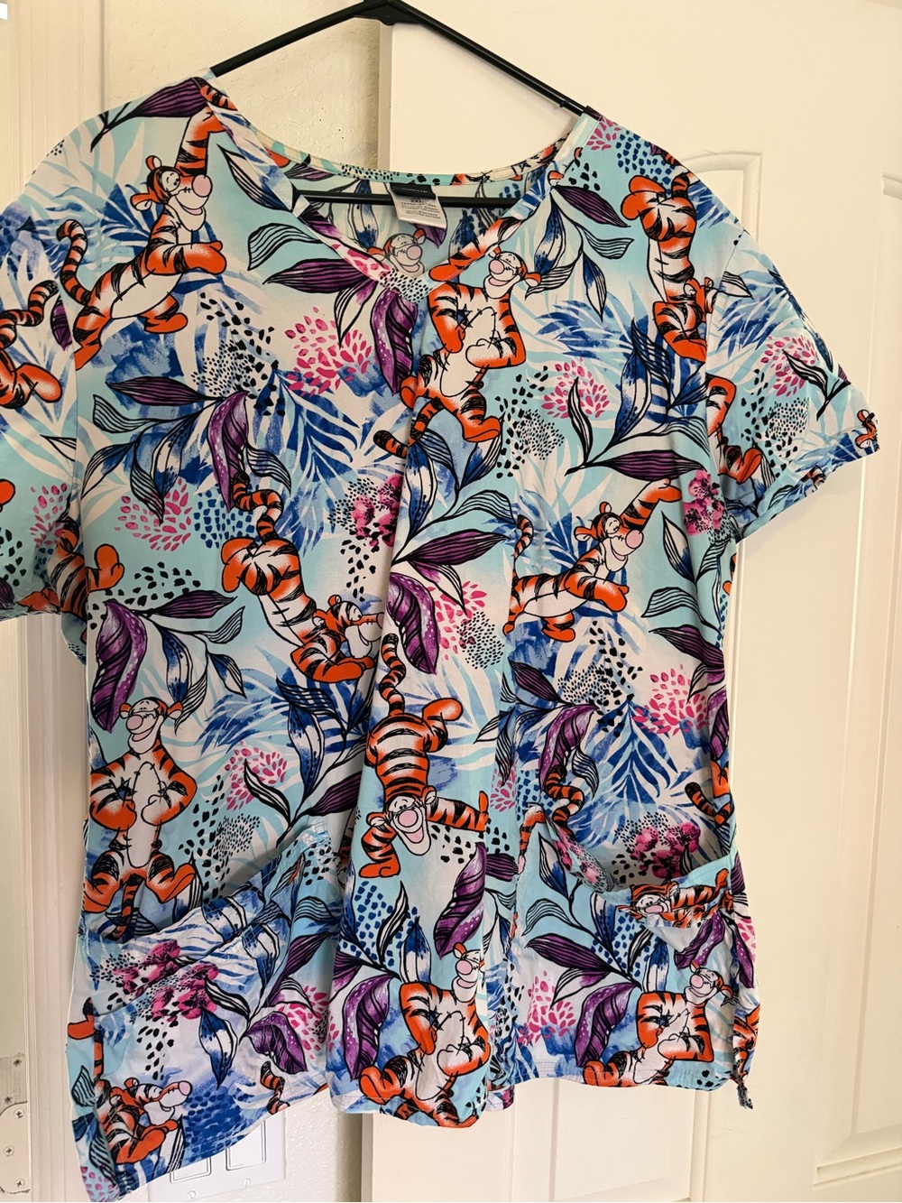 Disney Tigger Print Short Sleeve Women’s scrub Top - Light Blue